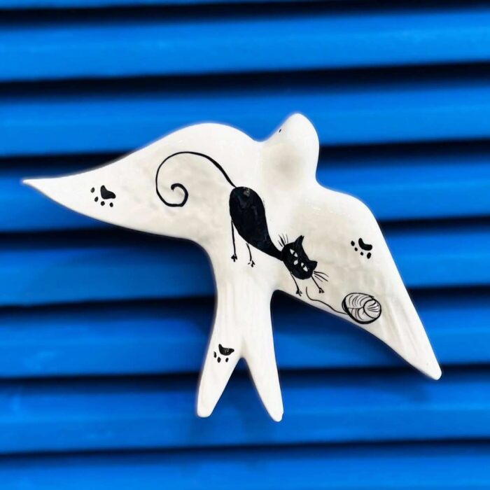 andorinha em ceramica padrão gato