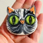 iman de gato cinzento pintado á mão