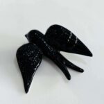 andorinha em cerâmica na cor preta