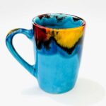 caneca alta em ceramica na cor azul pintada á mão