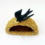 ninho de andorinha feito em cerâmica visto de cima