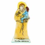 figura do santo antónio em vidro na cor amarela escura
